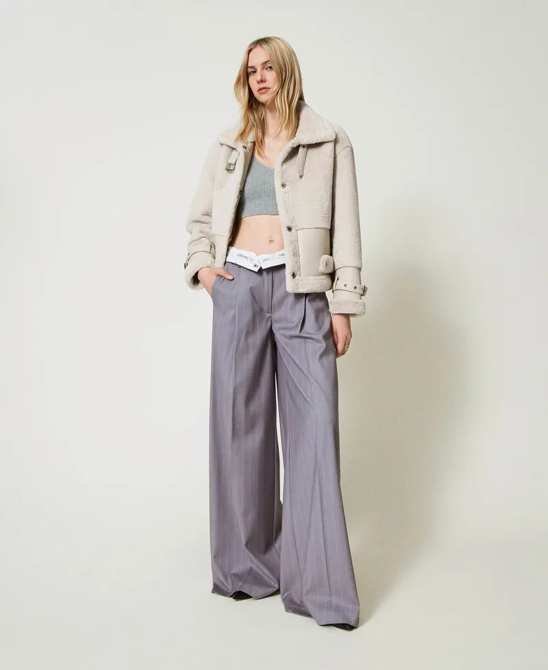 Giacca in faux fur con cinturini